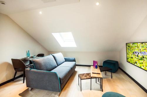 Posezení v ubytování Logis Villa C Hôtel