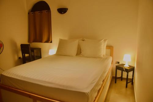 Una cama o camas en una habitación de Tienne Del Mar
