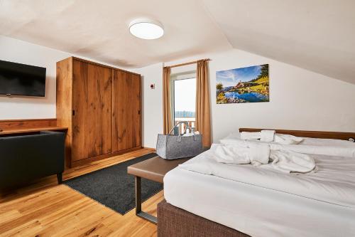 Uma cama ou camas num quarto em Hotel Rupertihof