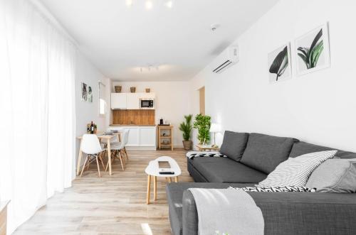 O zonă de relaxare la Apartamentos Toboso Plaza