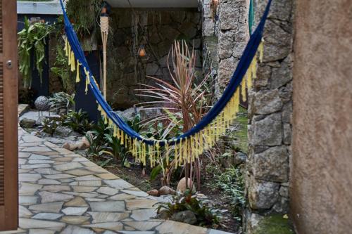 En have udenfor Viva a Ilha mais Bela - 150m das praia do Viana e siriúba