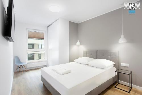 Posteľ alebo postele v izbe v ubytovaní MS Apartments Sky Tower VI