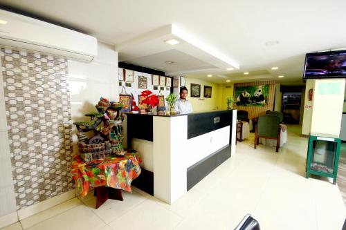 Kuchyň nebo kuchyňský kout v ubytování New Hotel Panda