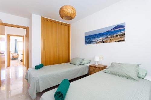 Posteľ alebo postele v izbe v ubytovaní SEA PEARL Holiday Home by Sunkeyrents