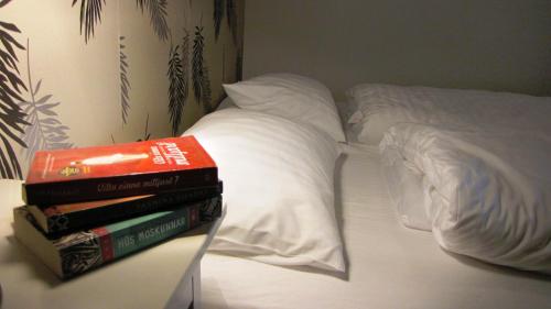 Un ou plusieurs lits dans un hébergement de l'établissement Halllandsnes Apartments
