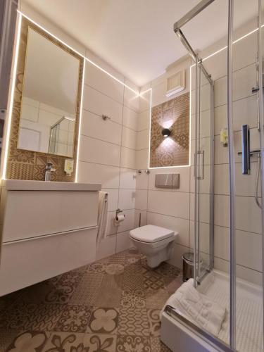 Koupelna v ubytování Ambiente Hotel garni