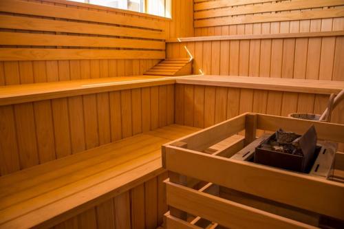 a inside of a sauna with a box in it at Pinamar Beach Resort in Pinamar