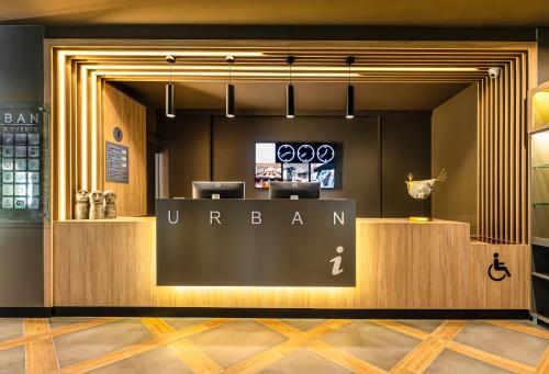 a store front of a u bar with a sign on it at Hotel Urban in Plovdiv
