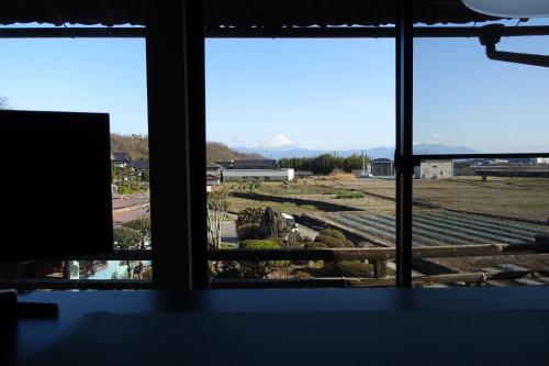 a view from a window of a train yard at HIKE in Nirasaki