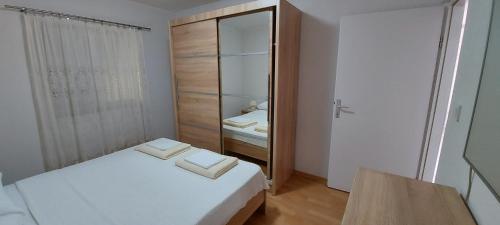 Posteľ alebo postele v izbe v ubytovaní Apartment Anchi