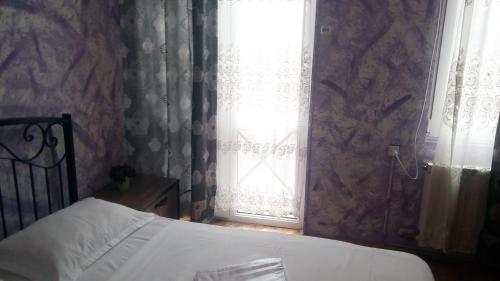 Postel nebo postele na pokoji v ubytování Hotel Isani
