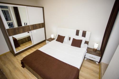 Кровать или кровати в номере Lux Apartment