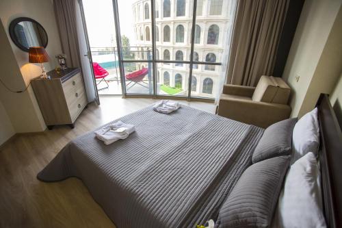Кровать или кровати в номере Lux Apartment