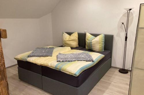 Ein Bett oder Betten in einem Zimmer der Unterkunft Ferienwohnung im Biosphärenreservat Drömling