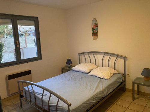Llit o llits en una habitació de gîte la source milieu