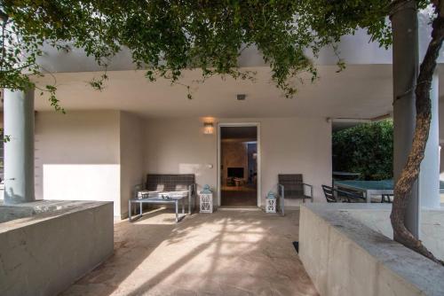 Αίθριο ή υπαίθριος χώρος στο Complex Lagonissi Residence with swimming pool.