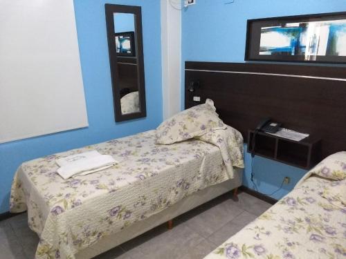 Cama o camas de una habitación en Hotel El Circulo