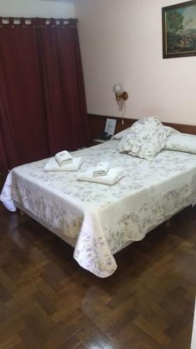 Cama o camas de una habitación en Hotel El Circulo