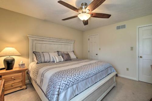 a bedroom with a bed and a ceiling fan at Lexington Home about 2 Mi to University of Kentucky! in Lexington