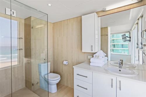 A bathroom at One The Esplanade Apartments on Surfers Paradise