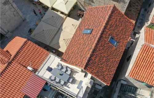 an overhead view of orange roofs on buildings at Cozy Home In Omis With Kitchen in Omiš