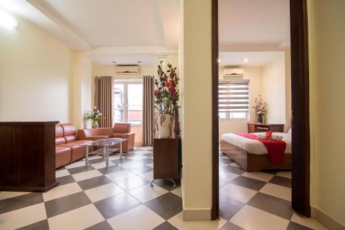 Giường trong phòng chung tại Hai Duong Apartments 70 Van Kiep