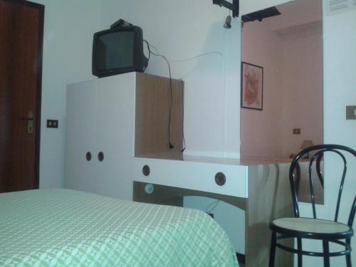 Albergo Tenda Verdeにあるベッド