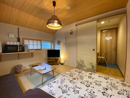 TV a/nebo společenská místnost v ubytování Hotel EL Shinjuku 6