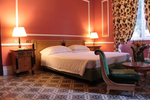 Postel nebo postele na pokoji v ubytování Hotel Albani Firenze