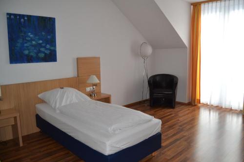 Giường trong phòng chung tại Hotel Sammeth Bräu