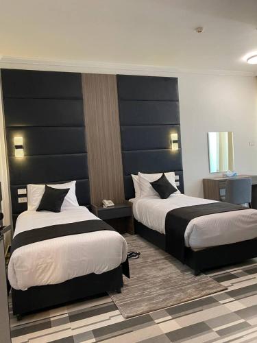 Katil atau katil-katil dalam bilik di ECCO Modern Guest House