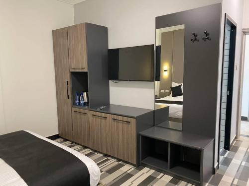 Katil atau katil-katil dalam bilik di ECCO Modern Guest House