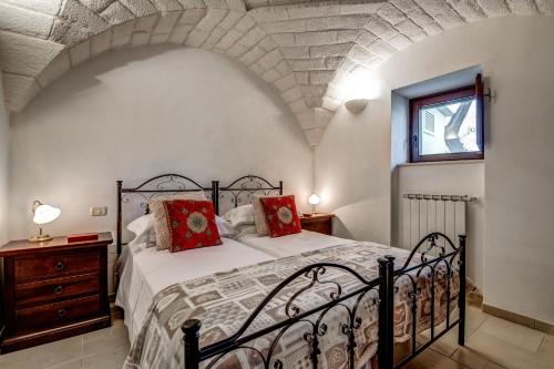 Llit o llits en una habitació de Trulli Margherita