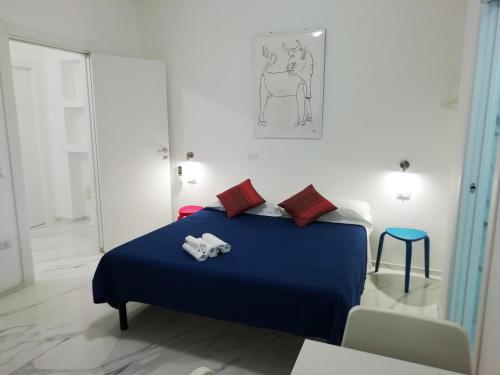Posteľ alebo postele v izbe v ubytovaní L'Altare Bianco