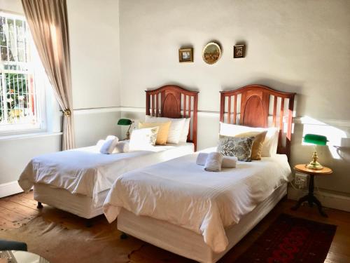 Cama o camas de una habitación en John Montagu Accommodation