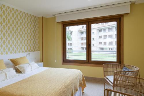 Postel nebo postele na pokoji v ubytování P18 Villalia Apartamento en la Isla de la Toja