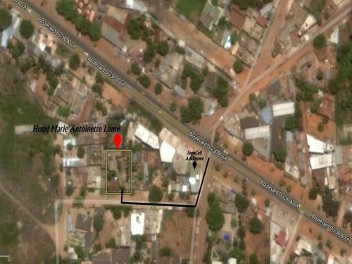 a map of a neighborhood with a red marker at Hotel Marie Antoinette Lome in Lomé