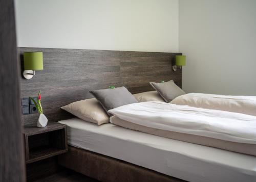 Cama o camas de una habitación en eee Hotel Graz