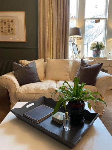 a living room with a couch and a table at stay bed and breakfast in Culross