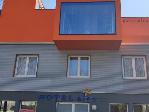 a hotel with a large window on the side of a building at Hotel Aleo in Bochum