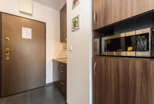 Kuchyň nebo kuchyňský kout v ubytování Browar Gdanski Budget by Noclegi Renters