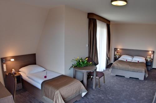 מיטה או מיטות בחדר ב-Villa Martini