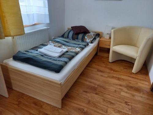 Ein Bett oder Betten in einem Zimmer der Unterkunft Apartmán Bára
