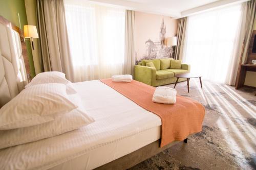 Ένα ή περισσότερα κρεβάτια σε δωμάτιο στο Kaiserhof Hotel