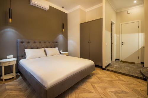 Cama o camas de una habitación en DayFlat Apartments on Mykhailivs'ka