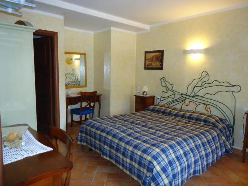 Postel nebo postele na pokoji v ubytování La Dimora di d'Annunzio