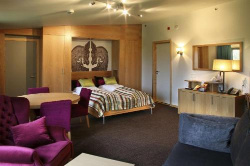 Ένα ή περισσότερα κρεβάτια σε δωμάτιο στο Scandic Stiklestad