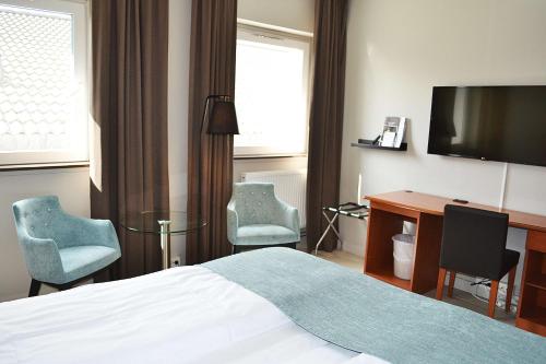Μια τηλεόραση ή/και κέντρο ψυχαγωγίας στο Thon Partner Hotel Central