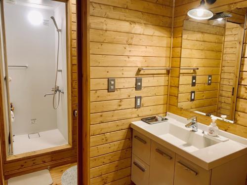 a bathroom with a sink and a shower at BALLAD HOUSE / Vacation STAY 31548 in Yachimata