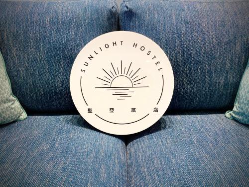 a sticker on the back of a couch with the words midnight hottest fire at Seyan Inn in Eluan